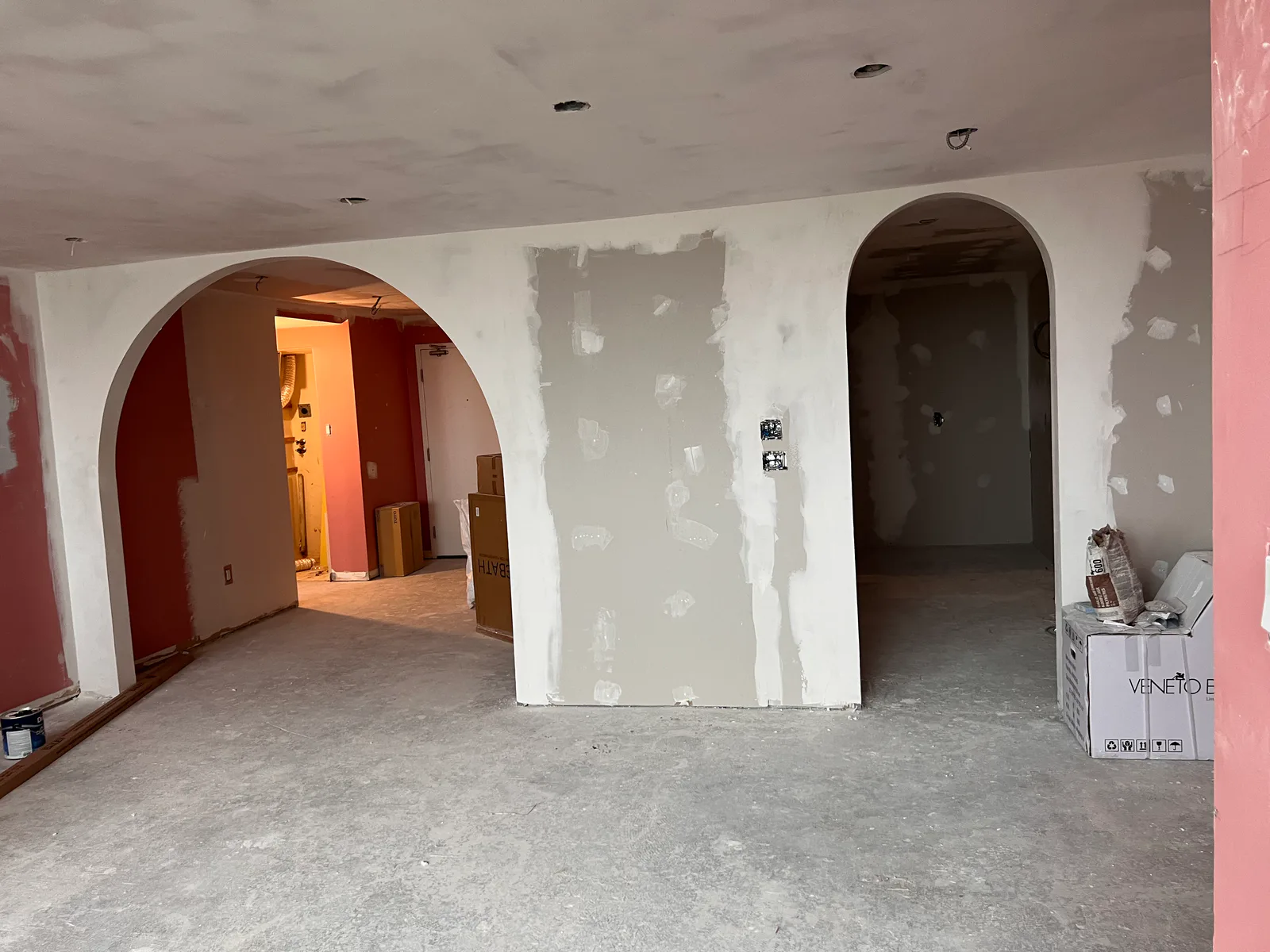 Drywall walls and arched openings before final finishing at 3000 Bathurst