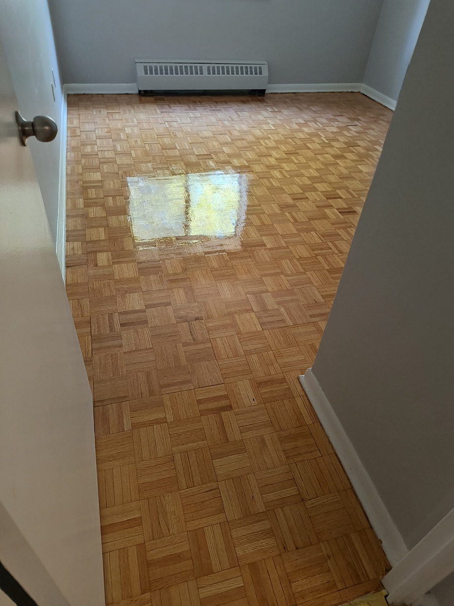 Dixon Road Etobicoke parquet floor after repair sanding and finishing