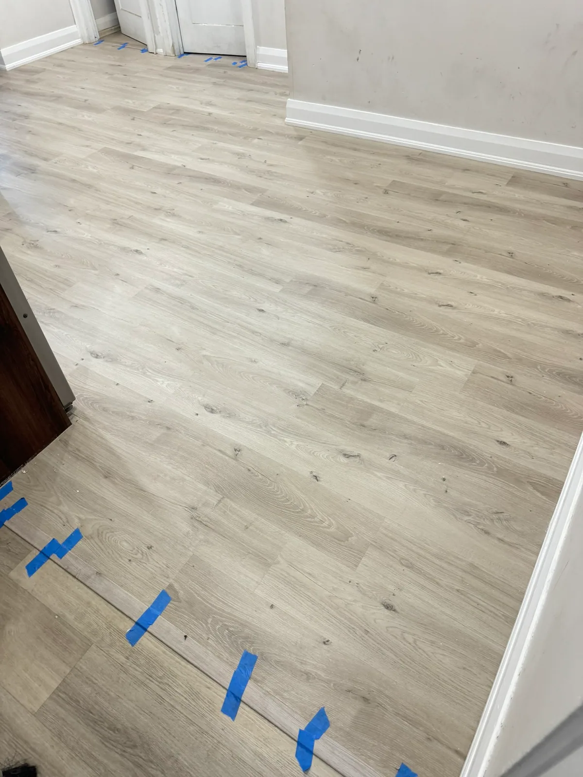 Completed light plank flooring at the Eglinton Avenue West Toronto residence