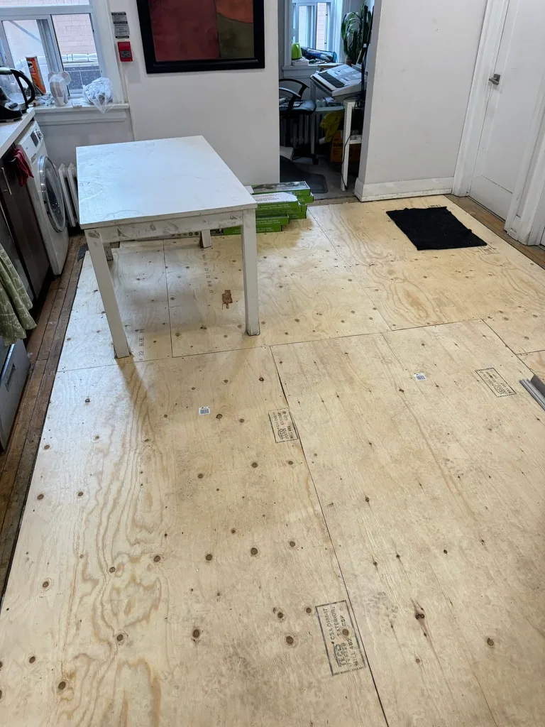 Plywood subfloor panel layout before new finish flooring installation