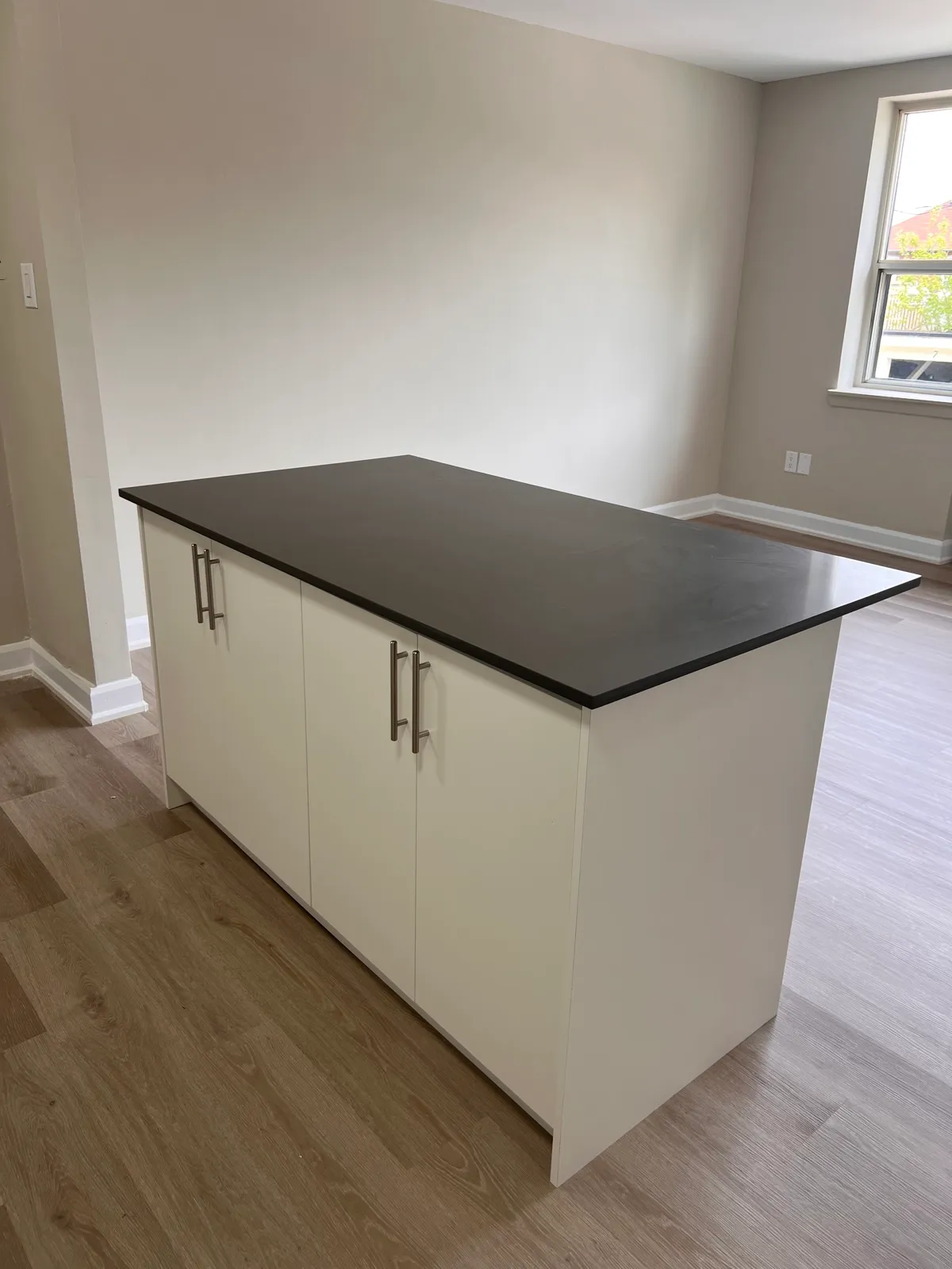 Finished kitchen island in an open living space