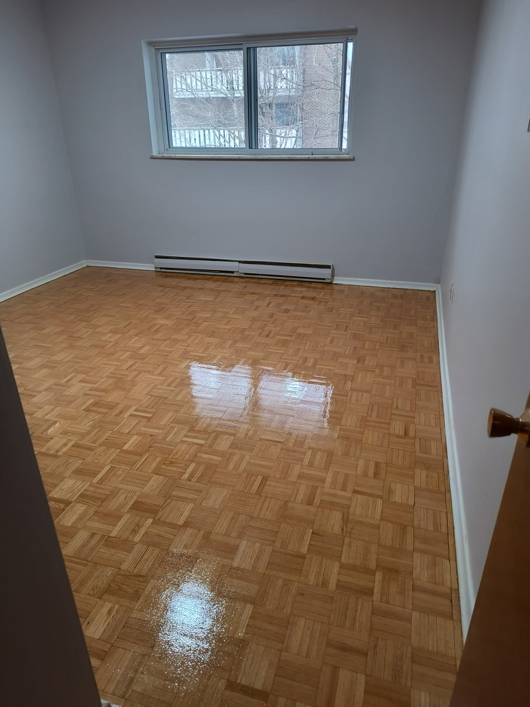 Refinished parquet flooring in a Hamilton bedroom