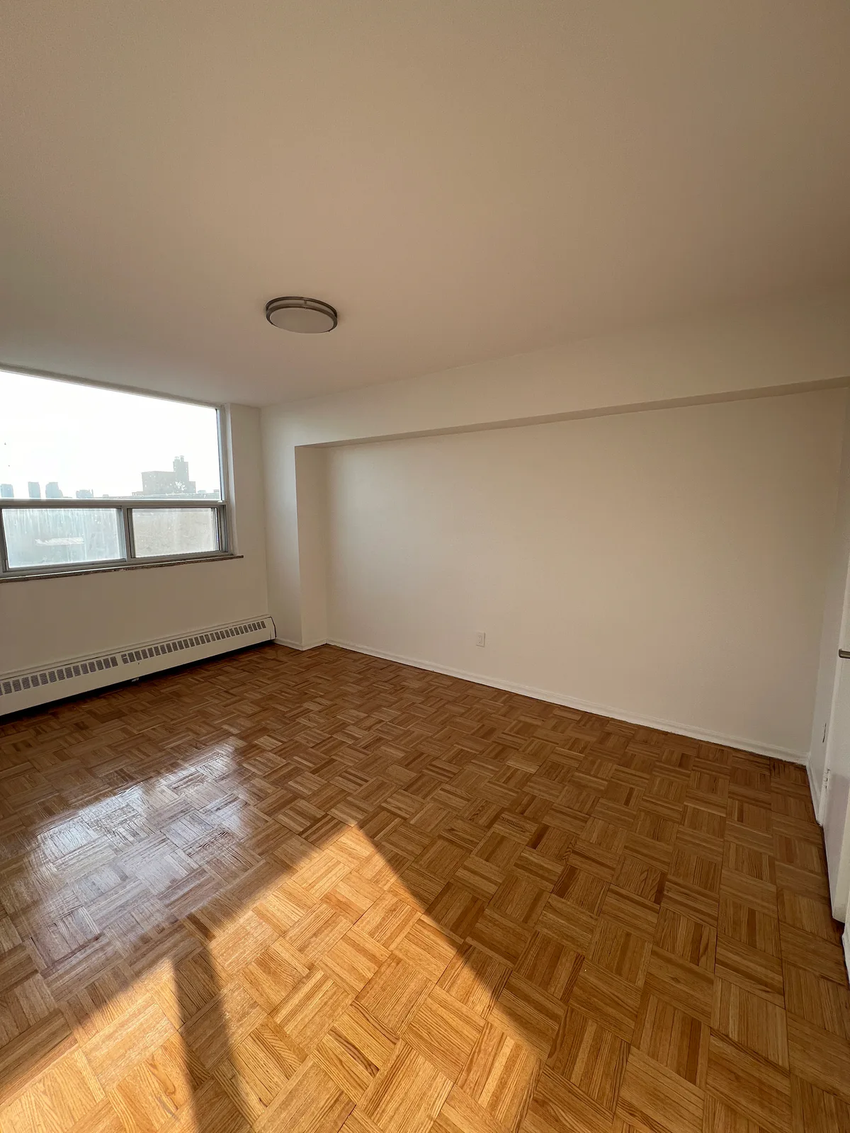 Updated bedroom with clean paintwork and parquet floor at Kingsbridge, Bathurst