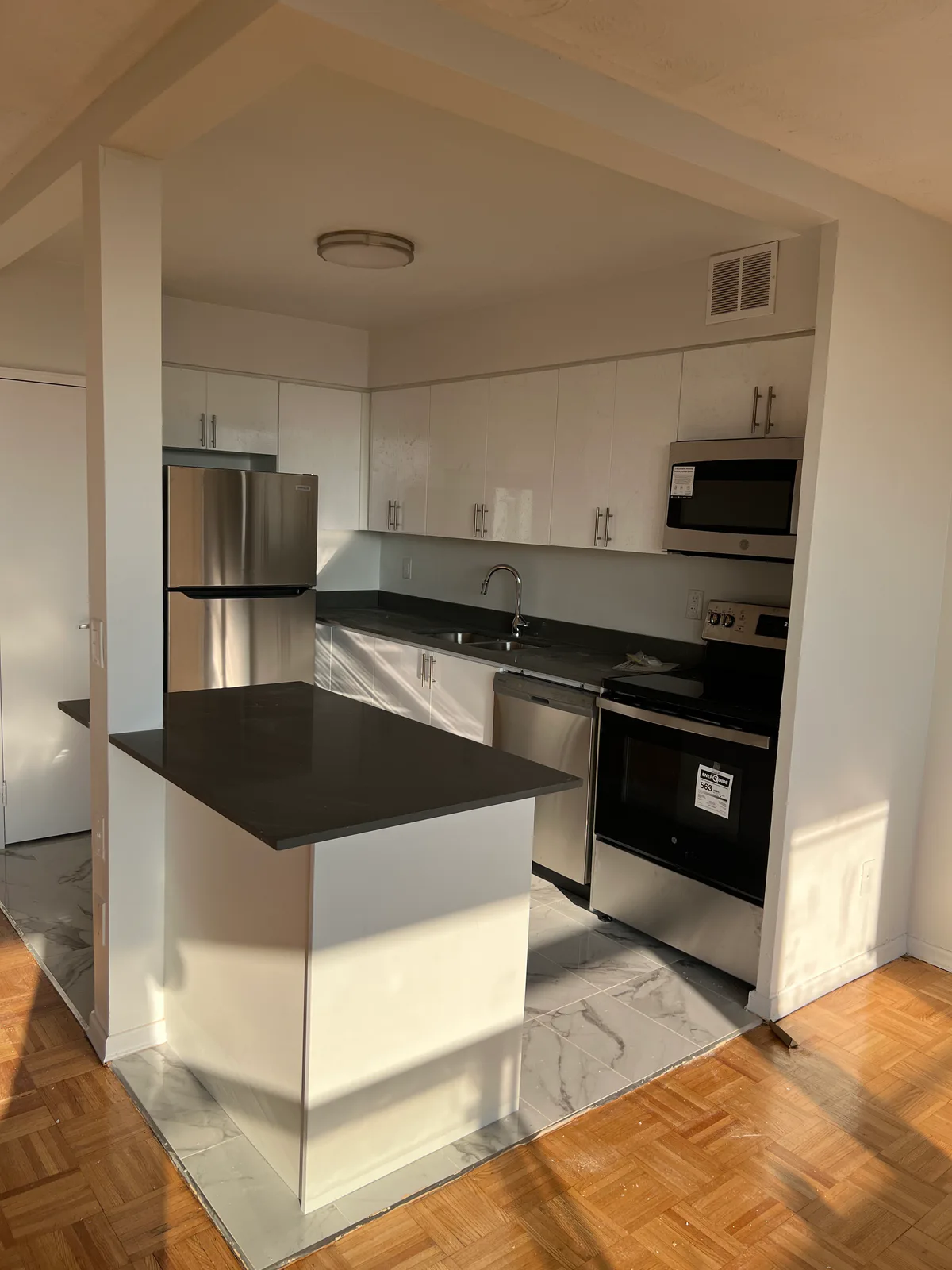 Completed open-concept kitchen close view at Kingsbridge, Bathurst