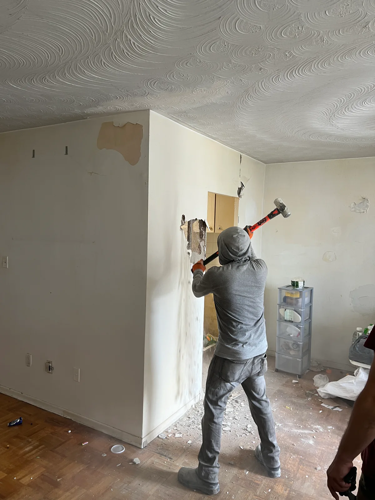 Wall demolition underway in the Kingsbridge apartment in Bathurst, Toronto
